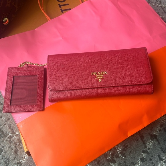 Prada Handbags - Prada large saffiano leather wallet